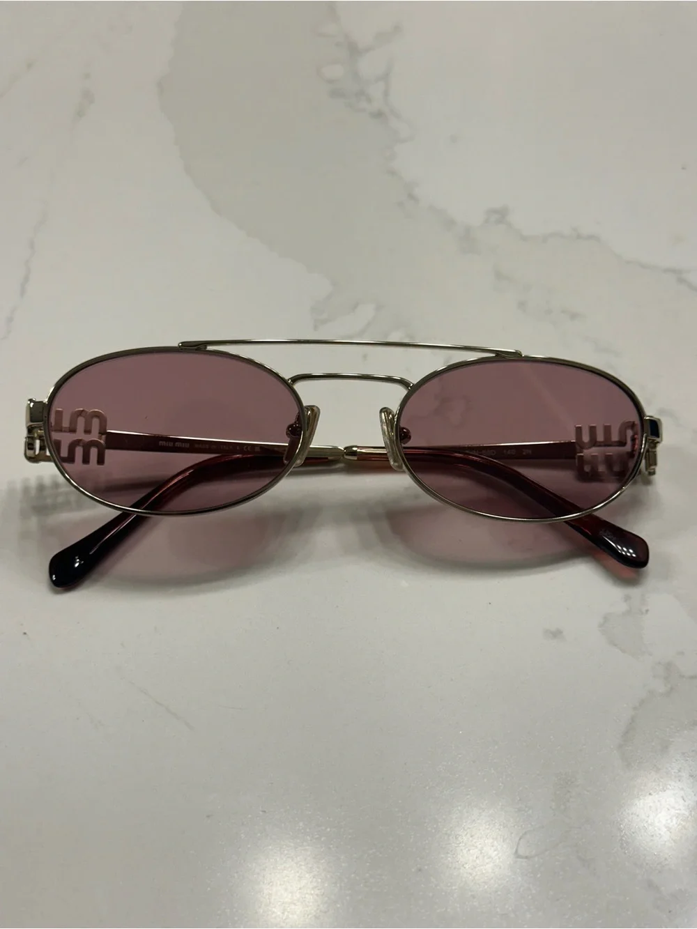 Miu Miu Gold Frame Sunglasses with Pink Lenses